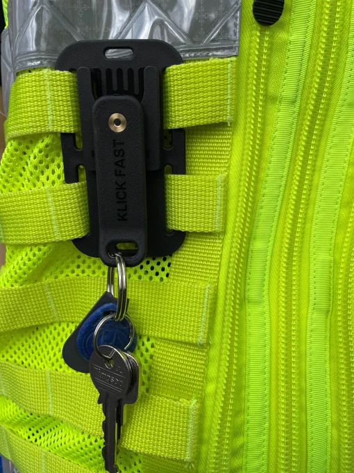 Peter Jones Klick Fast Keyring attached to Klick Fast Quad MOLLE Dock for Secure Attachment of Keys to a MOLLE Vest