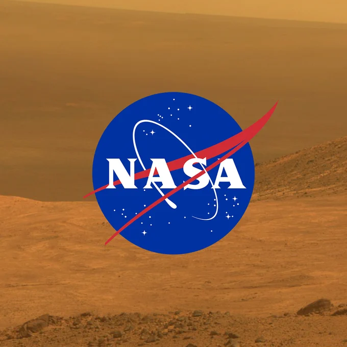 The NASA meatball against a photo of Mars' surface. The planet is reddish, rocky, and dusty. Credit: NASA