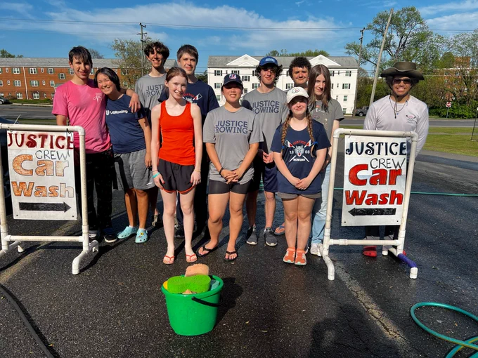 Justice Rowing group photo at car wash