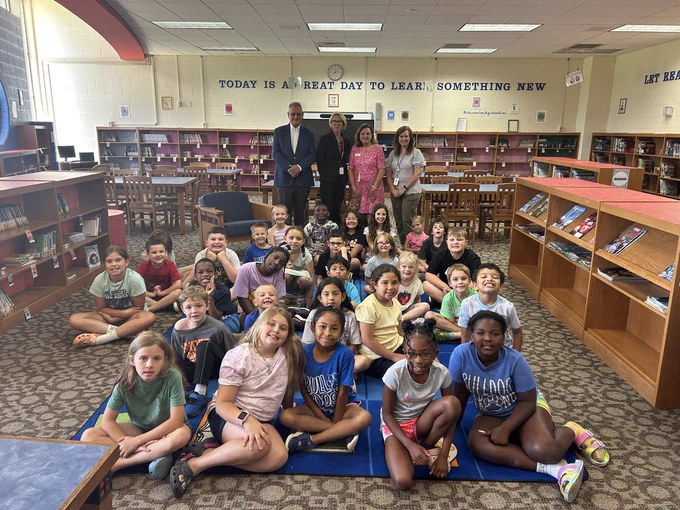 Kids and leadership smiling for a photo