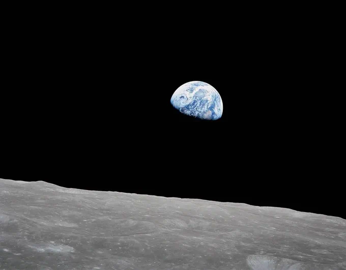 On Dec. 24, 1968, Apollo 8 astronauts Frank Borman, Jim Lovell, and Bill Anders became the first humans to orbit the Moon, and the first to witness the magnificent sight called “Earthrise.” As the spacecraft was in the process of rotating, Anders took this iconic picture showing Earth rising over the Moon’s horizon. In 2018, the International Astronomical Union commemorated the event by naming a 25 mile diameter crater “Anders’ Earthrise.” Image credit: NASA