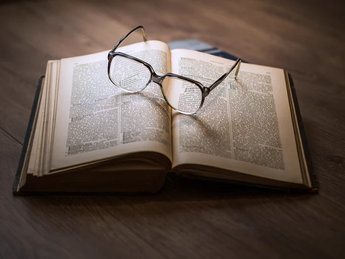 book with glasses on it