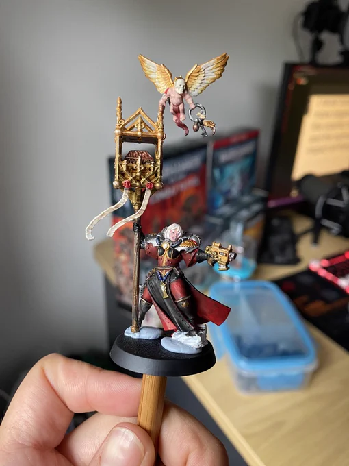 Painted Warhammer battle sister miniature