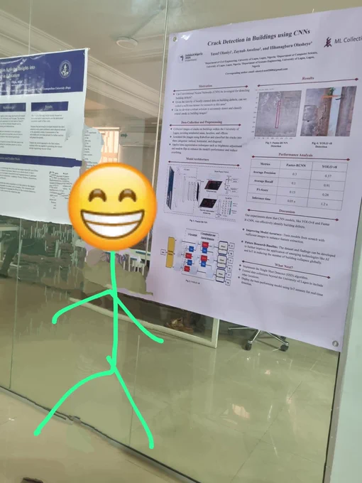 Ifihan, shining her teeth wide next to the poster.
