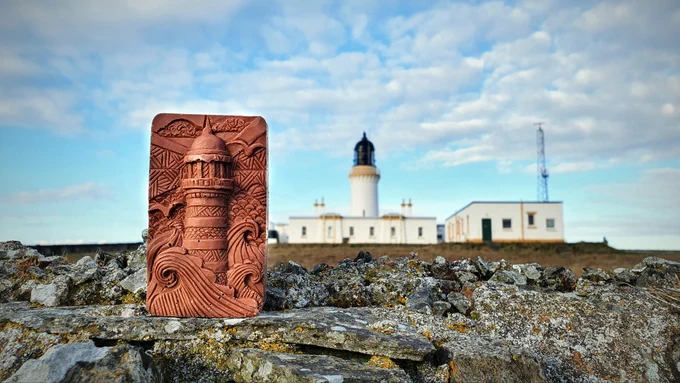 A chocolate bar showing a lighthouse in front of Noss Head Lighthouse