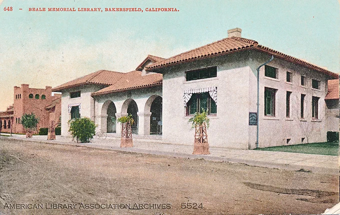 Color postcard with a library building.