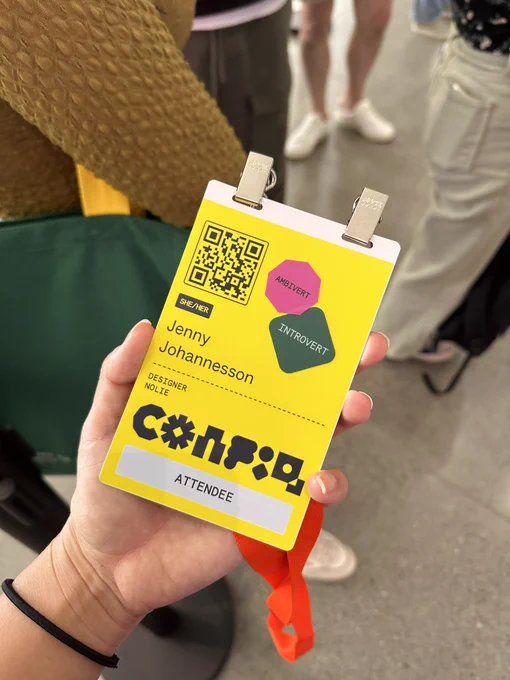 Conference ticket to Config in San Francisco. Stickers say Ambivert and Introvert