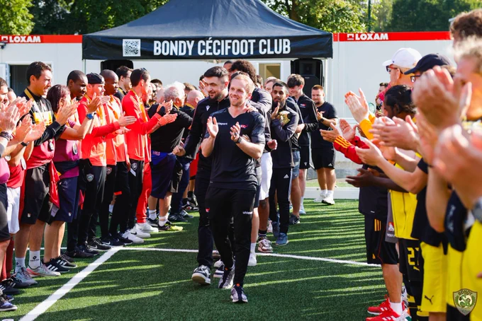 RNC team walking through the guard of honour to collect the league title