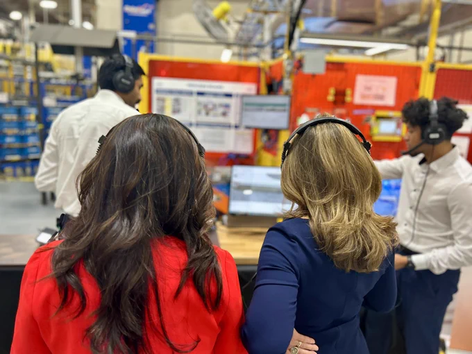 The Deputy Prime Minister and Minister Mary Ng talking to workers at Alfield Industries in Woodbridge, ON.