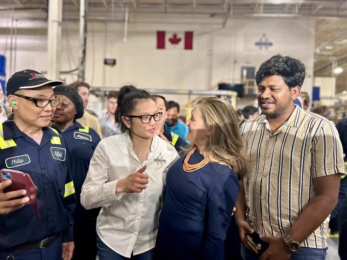 The Deputy Prime Minister talking to workers at Alfield Industries in Woodbridge, ON.