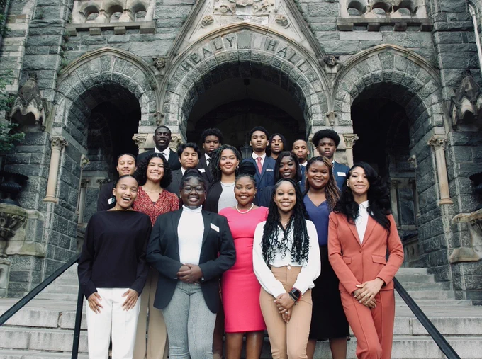 Summer Institute students outside of Healy Hall 
