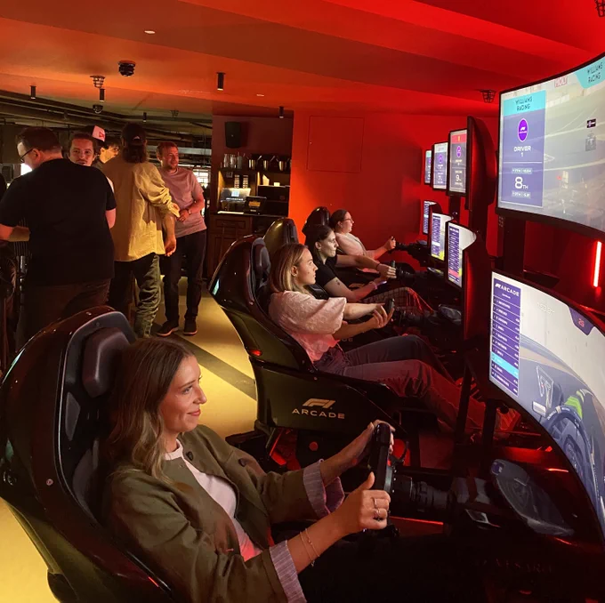 The Honest team racing at the F1 Arcade