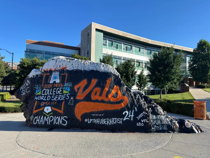The Rock painted with the "Vols" logo and celebrating the 2024 Men's College World Series champions title.