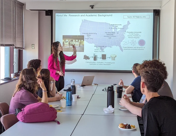 Dr. L. Taylor delivers a breakfast workshop on  'Communicating Science'