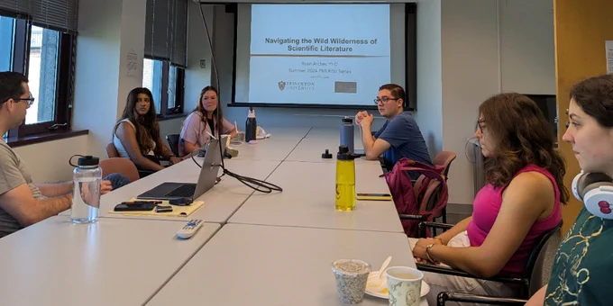 REU students attend a breakfast workshop with Dr. Archer