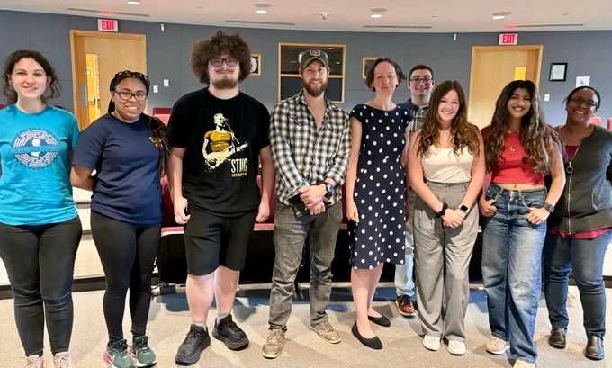 Group of REU students from PCCM and other departments chatting to Prof. Nelson after her seminar.