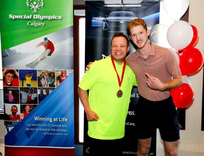 Special Olympics athlete David Nicholson and Dustin Wolf