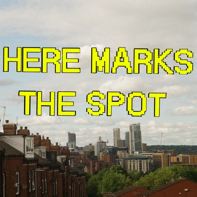 a photo of Leeds terraced houses and the city skyline with the words ‘HERE MARKS THE SPOT’ in yellow writing over the top