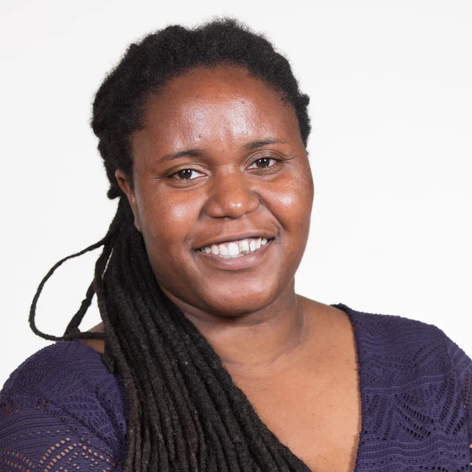 A head and shoulders photograph of Sharon Thompson. 