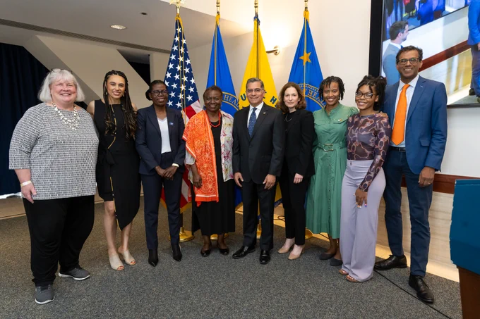 Secretary Becerra in group photo 