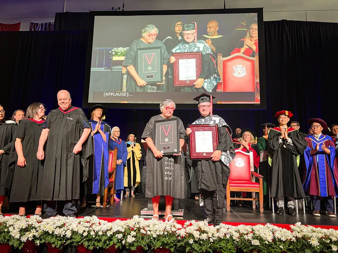 Wendy McNeney, Cruthers’ mother, accepting her honorary Doctor of Letters award. 