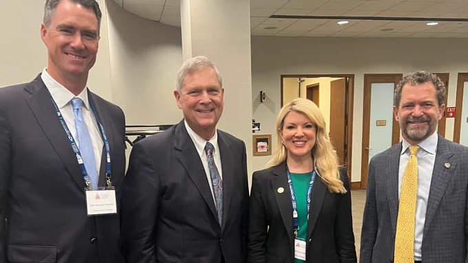 President Amy Parsons poses with President of Colorado Mesa University John Marshall, CU President Todd Saliman and Secretary of Agriculture Tom Vilsack. 