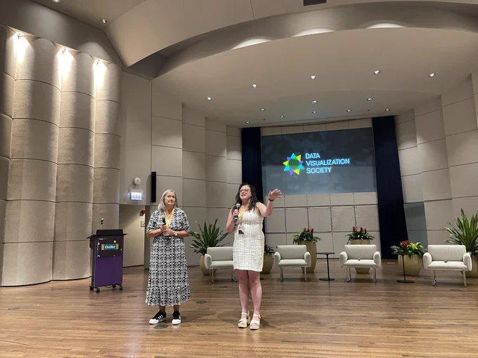 Opening of outlier. Conference stage with the two showrunners Julia Hennelly and Emily Kund.