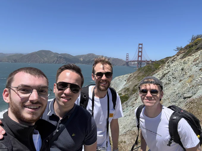 Group picture of Gianpiero, Dennis, me and Frank in front of the Golden Gate Bridge