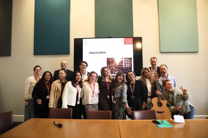 A group picture of the team, including academic and professional service staff at The Dickson Poon School of Law.