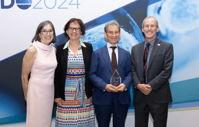 Professor Morris Brown with Gerald D. Aurbach Award (2nd left)