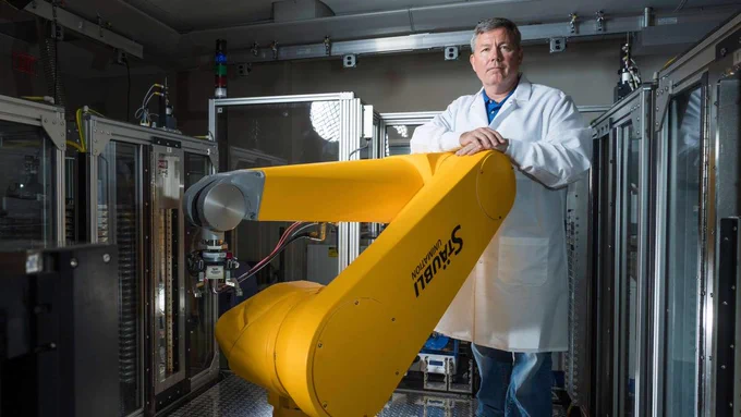 Dr. Timothy Spicer stands in his research lab at The Herbert Wertheim UF Scripps Florida Institute for Biomedical Innovation and Technology.  