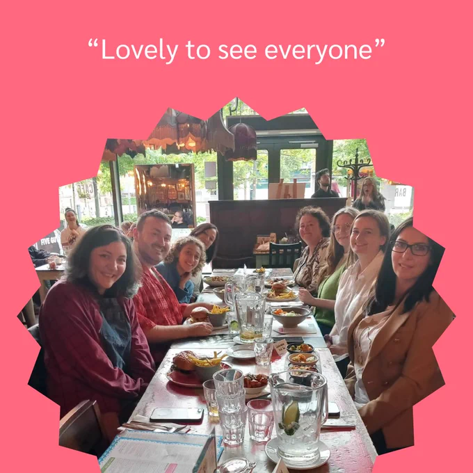 8 volunteers sat at table with food and caption "Lovely to see everyone."