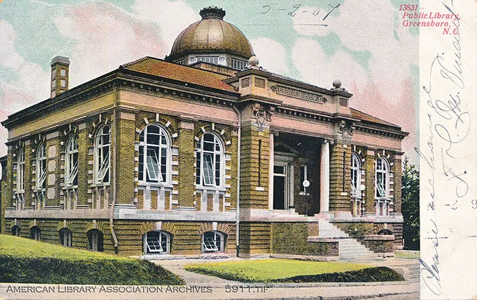 Color postcard of a library building.