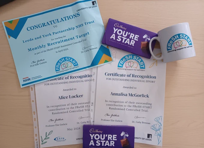 Certificates, mug and chocolates from the Fresh Start study team.
