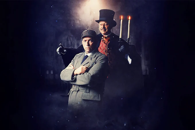 A Sherlock Carol previous cast members Ben Caplan and Kammy Darweish in costume