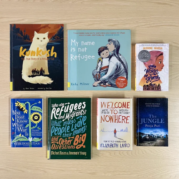A flatlay of books on the experiences of refugees.