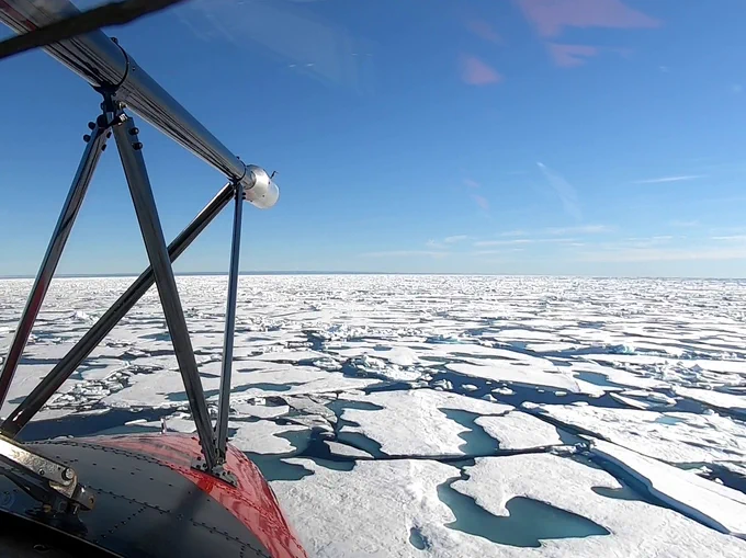View from red airplane looking at sea ice by Alexandra Weiss of British Antarctic Survey.