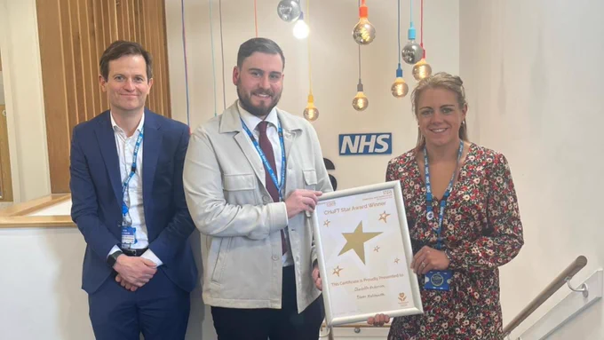 Star Award winners Oliver and Rebecca with Deputy Chief Executive Rob Aitchison
