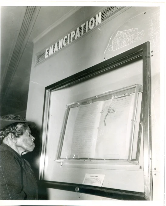Mrs. Sally Fickland, viewing the Emancipation Proclamation in the Freedom Train at Philadelphia, on September 17, 1947.
