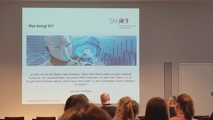 Foto einer Präsentation zum Thema "Was bringt KI?"