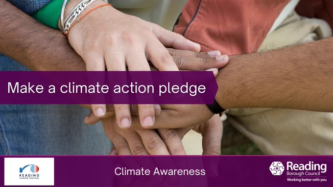 Hands on top of each other making a pledge