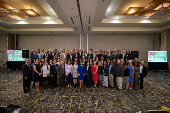 The newest class of the National Academy of Inventors Senior Members stands together following the Senior Member Induction Ceremony at the National Academy of Inventors' 13th Annual Conference.