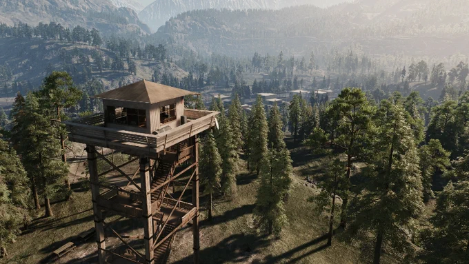 A screenshot from Ranch Simulator, showing a wooden watchtower in the foreground, looking out over a forest and a small town, with mountains in the background.