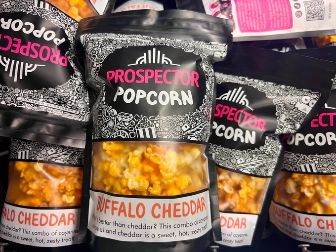 Buffalo Cheddar bags lay on top of one another.