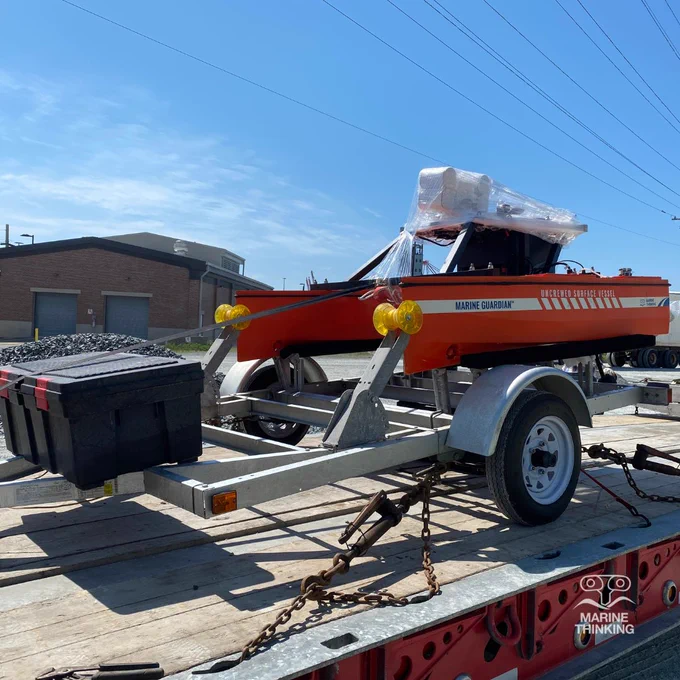 Marine Guardian uncrewed surface vessel (USV) securely mounted to a trailer. 