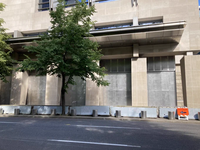 Portland federal courthouse with steel barriers on the front of the building