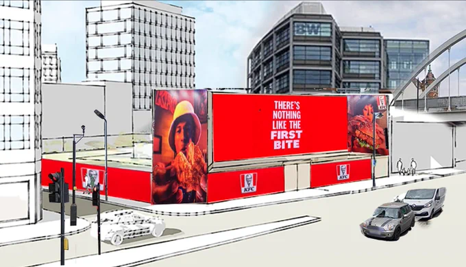 Shoreditch with a huge digital billboard artist's impression with a KFC advertisment added to illustrate what it looks like with an ad running.