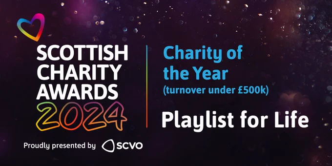 Black confetti background with the Scottish Charity Awards 2024 logo plus text which reads "Charity of the Year (turnover under £500k). Playlist for Life. Proudly presented by SCVO."