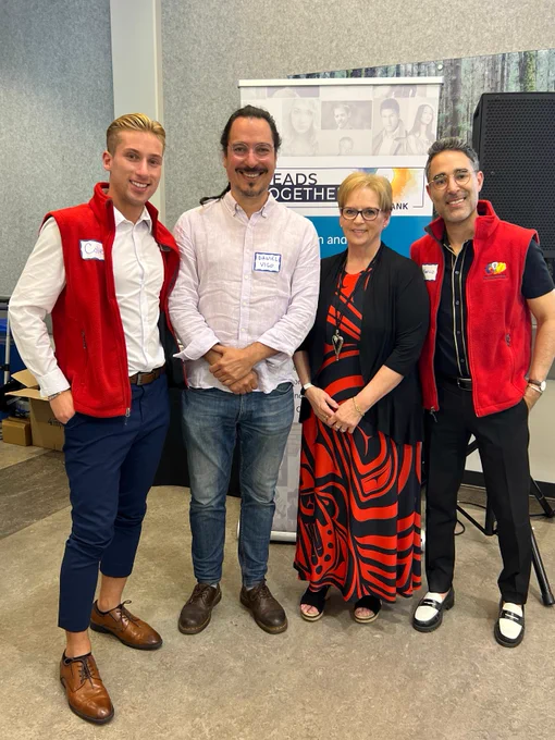 Cole Kennedy (left), Dr. Daniel Vigo, Janelle Breese-Biagioni, and Dr. Mauricio Garcia-Barrera (right) at the annual BC Consensus on Brain Injury Day, June 20, 2024. 