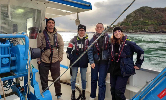 Lola Henneuse and friends at sea.